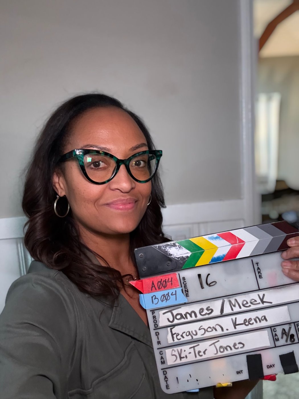 Delece James on set with a production slate